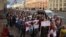 Belarus opposition supporters attend a rally in Minsk on August 27 to protest against a disputed presidential election.