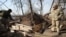 Ukrainian soldiers dig and equip trenches at their new positions not far from the town of Zolote in the Luhansk region on November 2. 