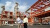 File photo: Iranian workers are seen at the South Pars gas field near the southern Iranian port of Assalouyeh, November 19, 2015