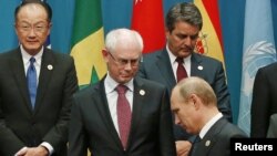 Президент Росії Володимир Путін біля голови Європейської ради Германа Ван Ромпея під час саміту G20, Брісбен, Австралія, 15 листопада 2014 рок