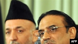 Pakistani President Asif Ali Zardari (right) is looking to forge closer relations with his Afghan counterpart, Hamid Karzai.