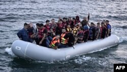 Лодка со спасенными беженцами. Иллюстративное фото.
