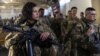 Members of the 82nd Airborne Division of the U.S. Army prepare for deployment to Poland from Fort Bragg, North Carolina, on February 14.