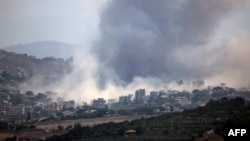 Smoke rises near a village in southern Lebanon following an explosion carried out by the Israeli military on July 23.