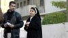 An Iraqi nun at the entrance of the Vatican's embassy in Baghdad, site of a suicide attack on 29 January.