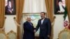 The secretary of Iran's National Security Council, Ali Shamkhani (right) shakes hands with Syrian Foreign Minister, Walid al-Muallem during his visit from Tehran. February 05, 2019.