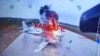Fragment i shkëputur nga videoja e publikuar nga SBU-ja që shfaq goditjen e një bombarduesi rusë në bazën ajrore Belaja në Irkutsk. 