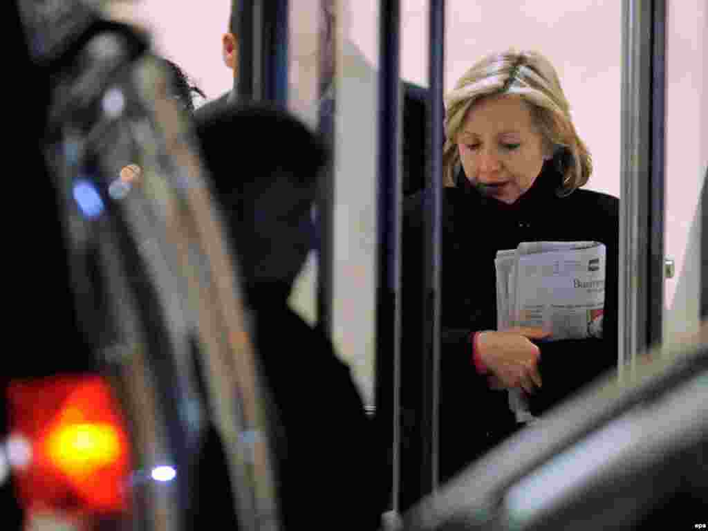 U.S. Secretary of State Hillary Clinton departs a New York hospital after visiting her ailing husband. - Former U.S. President Bill Clinton had an emergency operation to clear a blocked coronary artery.