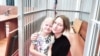 Polina Yevtushenko with her daughter in court, August 2024