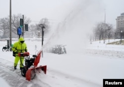 Вашингон шаарынын көчөлөрүн кардан тазалагандар, 25-январь, 2026-жыл