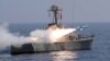 A handout picture provided by Iran's military shows a Nasr missile being fired from a navy warship during a military exercise.