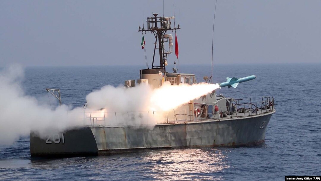 A handout picture provided by Iran's military shows a Nasr missile being fired from a navy warship during a military exercise.