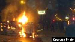 Armenia -- A car set on fire during the 01Mar2008 clashes in Yerevan between opposition protesters and security forces