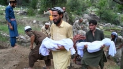 Afghans carry the deceased for funeral ceremony after earthquakes at Mazar Dara village in Nurgal district, Kunar province, in Eastern Afghanistan, on September 1, 2025.