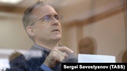 RUSSIA -- Former U.S. Marine Paul Whelan, who was detained on suspicion of spying, stands inside a defendants' cage as he attends a court hearing regarding the extension of his detention, in Moscow, September 17, 2019