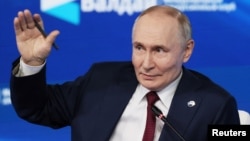 Russia's President Vladimir Putin speaks to the Valdai Discussion Club in Sochi on October 2.