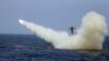 An Iranian locally made cruise missile is fired during war games in the northern Indian Ocean near the entrance to the Persian Gulf in 2020.