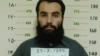 Afghanistan -- Anas Haqqani, a senior leader of the Haqqani network, arrested by the Afghan Intelligence Service (NDS) in Khost province is seen in this handout picture released October 16, 2014.