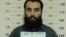 Afghanistan -- Anas Haqqani, a senior leader of the Haqqani network, arrested by the Afghan Intelligence Service (NDS) in Khost province is seen in this handout picture released October 16, 2014.