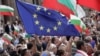 Waving EU and Bulgarian flags, anti-government protesters rally in Sofia on July 14. 