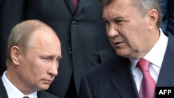 Putin and Yanukovych pictured in Kyiv in July 2013.