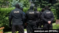 Armenia - Masked officers of the National Security Service try to raid the Mother See of Armenian Apostolic Church, June 27, 2025.