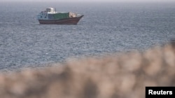 A vessel in the Strait of Hormuz, as seen from Musandam, Oman, on July 16.