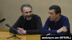 Armenia -- Artur Movsisian (L) and his lawyer Arayik Papikian in court, 4Dec2017.