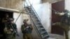 U.S. soldiers searching Iraqi homes (file photo)