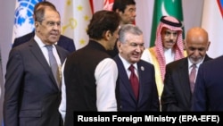 (Left to right) Russian Foreign Minister Sergei Lavrov, Pakistani Prime Minister Imran Khan, Uzbek President Shavkat Mirziyoev, and Afghan President Ashraf Ghani during a photo ceremony at the Central and South Asia 2021 conference in Tashkent on July 16.
