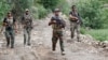 Members of the Afghan security forces on a foot patrol in Nangarhar Province before the Taliban takeover. (file photo)