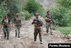 Afghan special forces on a foot patrol in April 2017