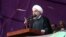 Iranian President Hassan Rohani addresses a campaign rally in the northeastern city of Mashhad on May 17.