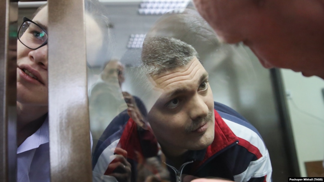Defendants Vladimir Kryukov and Peter Karamzin appear in court in Moscow on May 27.