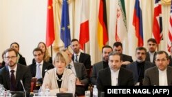 EU and Iranian delegates of Joint Comprehensive Plan of Action (JCPOA), the Joint Commission meet on October 19, 2015 at Palais Cobourg in Vienna. Araqchi is second from (R).