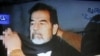 Former Iraqi leader Saddam Hussein shortly before his hanging on December 30 (file photo)