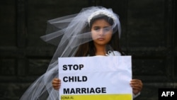 An Amnesty International protest to denounce child marriage in October 2016 in Rome