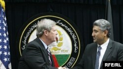 د افغانستان د کرنې وزیر محمد اصف رحیمي او د امريكا د كرنې وزير ټام ويلسك