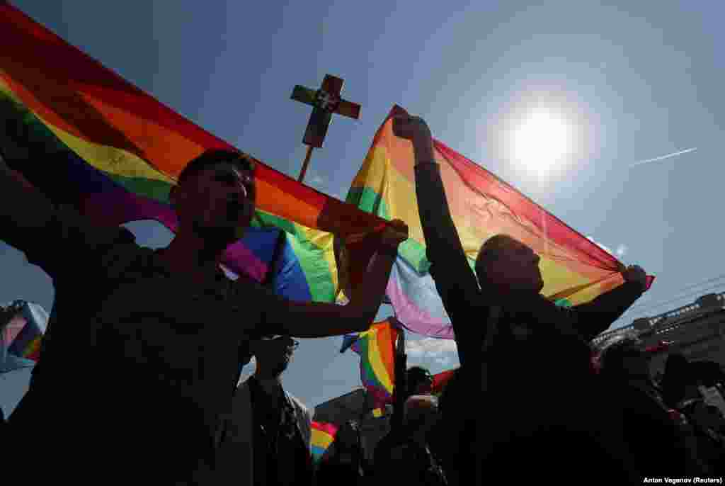 Lesbian, gay, bisexual, and transgender (LGBT) activists attend a May Day rally in St. Petersburg on May 1. (Reuters/Anton Vaganov)