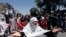 Afghanistan - An Afghan woman chants slogans during a protest in Kabul, Afghanistan June 2, 2017