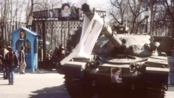 A tank with a portrait of Ayatollah Ruhollah Khomeini at the Niavaran Palace in Tehran on February 12, 1979