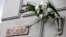 A plaque honoring slain opposition politician Boris Nemtsov was placed on the apartment block where he lived in Moscow on September 7. 