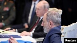 Armenia - Russian President Vladimir Putin and Armenian Prime Minister Nikol Pashinian attend a CSTO summit in Yerevan, November 23, 2023.