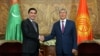 Turkmen President Gurbanguly Berdymukhammedov (left) and Kyrgyz President Almazbek Atambaev meet in Bishkek on August 5.