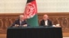 Afghan President Ashraf Ghani (R) and Abdullah Abdullah, his rival and former chief executive signed political agreement to end the election dispute on May 17.