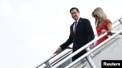 US Secretary of State Marco Rubio and his wife, Jeanette Dousdebes Rubio, arrive in Manila on July 21 ahead of a meeting of foreign ministers from the Association of Southeast Asian Nations (ASEAN). 