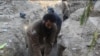 Islamic State fighters dig tunnels that they claim are helping them evade U.S. air strikes near Fallujah, Iraq.