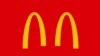 Logo-ul folosit de McDonald's în Brazilia pentru a le sugera clienților să păstreze distanța.