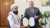 Орусиянын тышкы иштер министринин орун басары Андрей Руденко жана Ооганстандын элчиси Гуль Хасан. Москва. 3-июль, 2024-жыл.