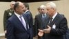 Belgium - Armenian Defense Minister Seyran Ohanyan (L) talks to his Azerbaijani counterpart Safar Abiyev on the sidelines of a NATO meeting in Brussels, 22Feb2013.